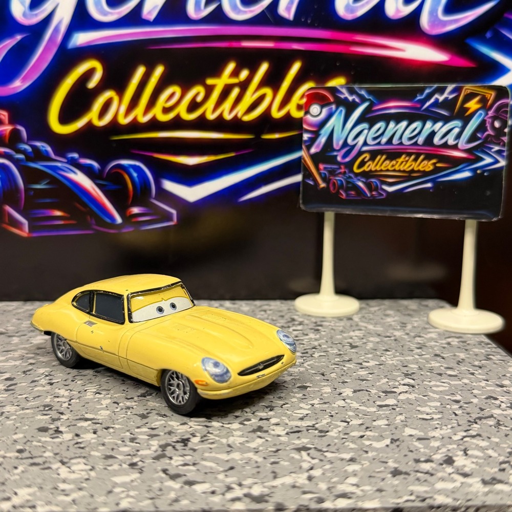 Disney Pixar Cars Diecast Yellow Jaguar E-Type Mattel W7027 1:64 Scale Toy Car
